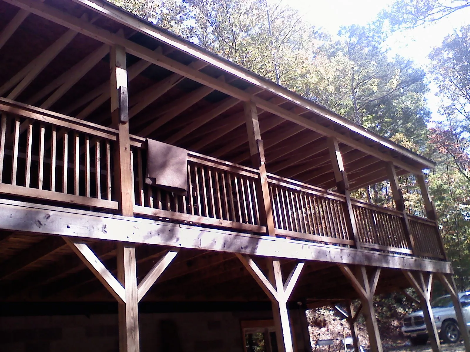 Timber framing under a new elevated porch and deck — Roof Leak Repair in Naples by Roofing Brothers